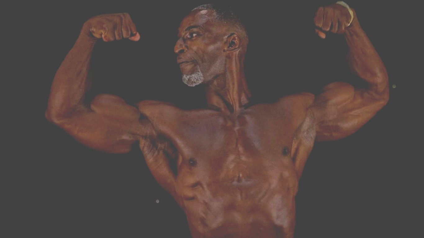 Strong athlete flexing — Shaun D Fitness